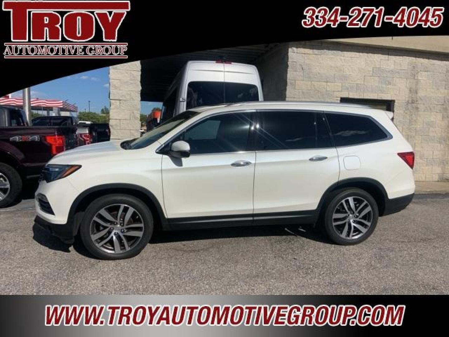 2017 White Diamond Pearl /Beige Honda Pilot Elite (5FNYF6H02HB) with an 3.5L V6 24V SOHC i-VTEC engine, Automatic transmission, located at 6812 Atlanta Hwy, Montgomery, AL, 36117, (334) 271-4045, 32.382118, -86.178673 - Photo#0