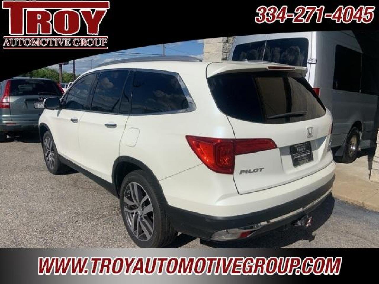 2017 White Diamond Pearl /Beige Honda Pilot Elite (5FNYF6H02HB) with an 3.5L V6 24V SOHC i-VTEC engine, Automatic transmission, located at 6812 Atlanta Hwy, Montgomery, AL, 36117, (334) 271-4045, 32.382118, -86.178673 - Photo#4