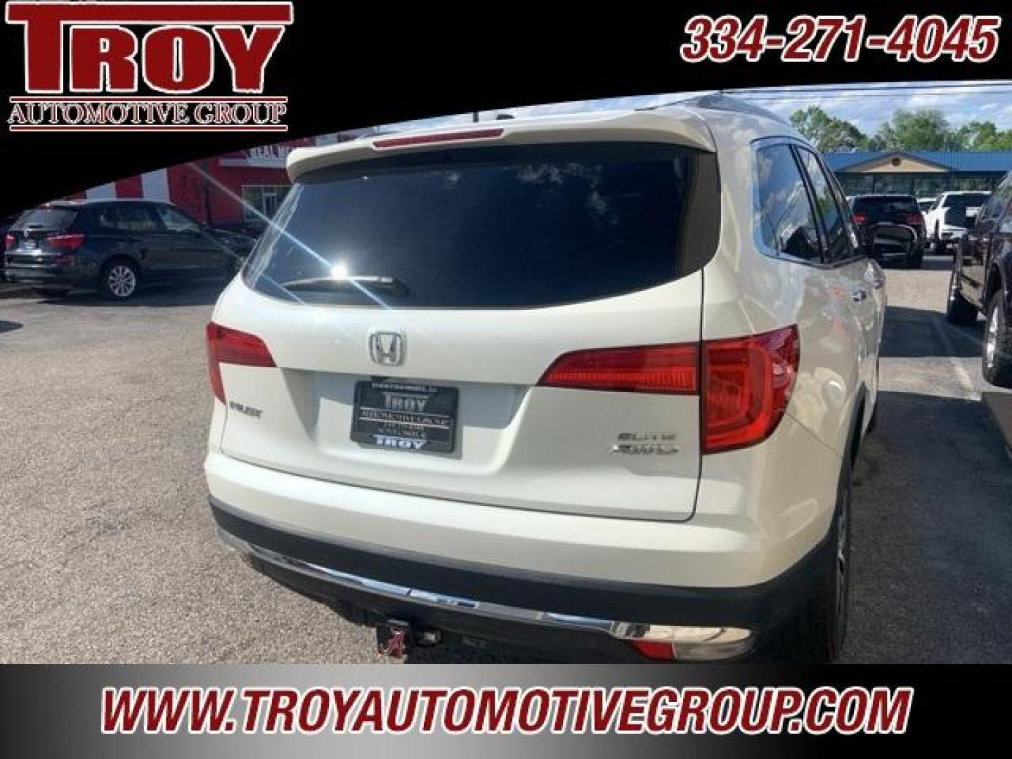 2017 White Diamond Pearl /Beige Honda Pilot Elite (5FNYF6H02HB) with an 3.5L V6 24V SOHC i-VTEC engine, Automatic transmission, located at 6812 Atlanta Hwy, Montgomery, AL, 36117, (334) 271-4045, 32.382118, -86.178673 - Photo#6