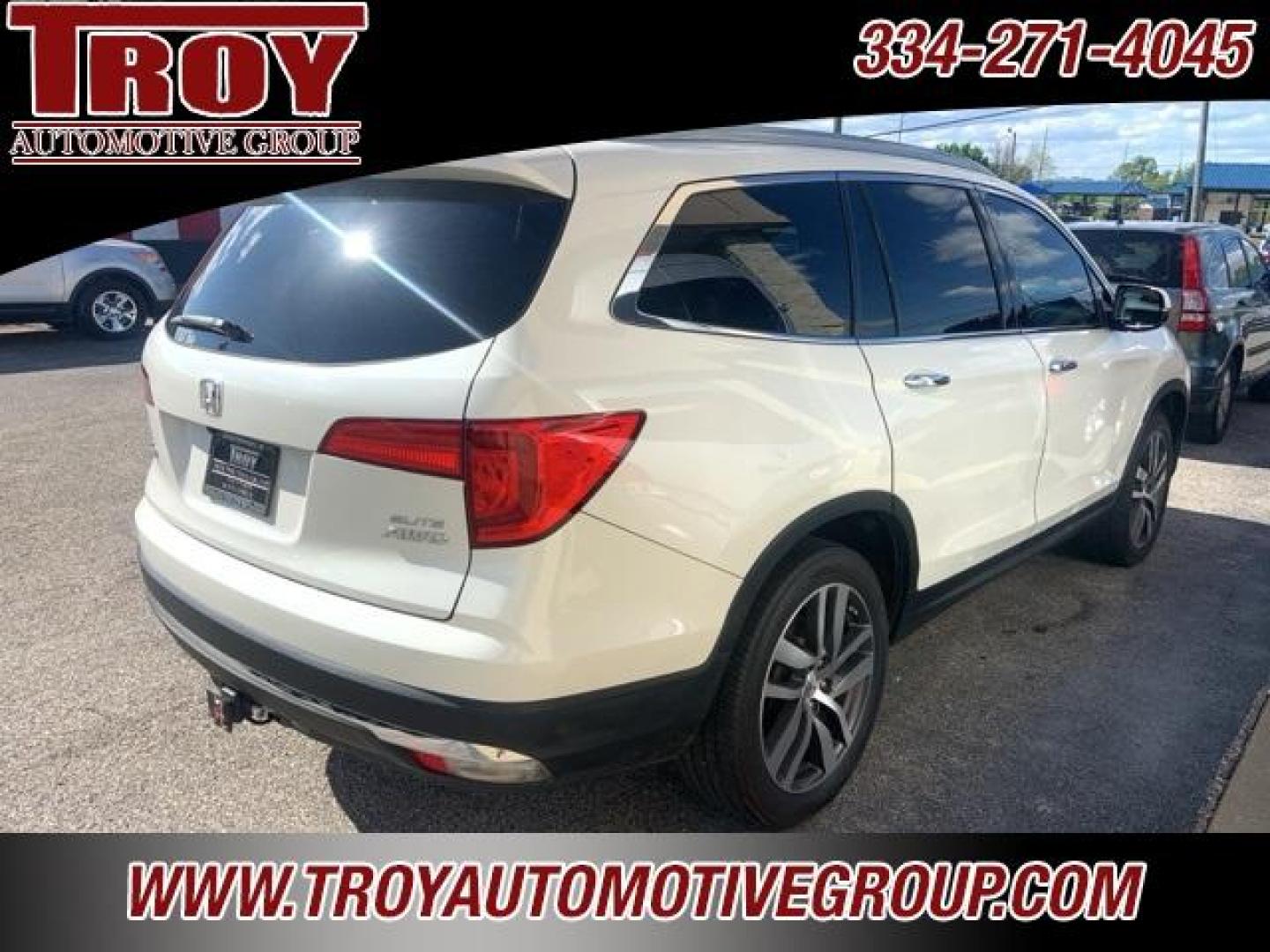 2017 White Diamond Pearl /Beige Honda Pilot Elite (5FNYF6H02HB) with an 3.5L V6 24V SOHC i-VTEC engine, Automatic transmission, located at 6812 Atlanta Hwy, Montgomery, AL, 36117, (334) 271-4045, 32.382118, -86.178673 - Photo#7