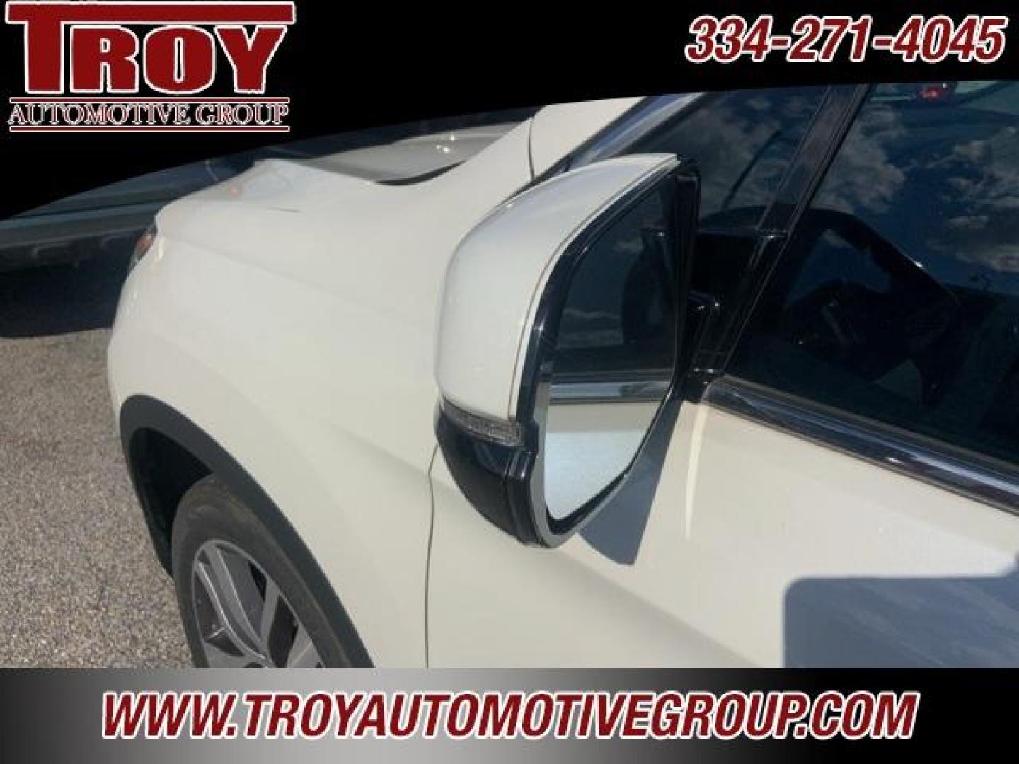 2017 White Diamond Pearl /Beige Honda Pilot Elite (5FNYF6H02HB) with an 3.5L V6 24V SOHC i-VTEC engine, Automatic transmission, located at 6812 Atlanta Hwy, Montgomery, AL, 36117, (334) 271-4045, 32.382118, -86.178673 - Photo#16