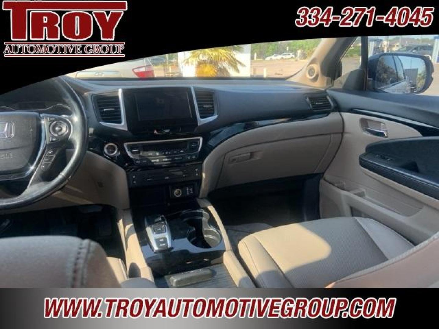 2017 White Diamond Pearl /Beige Honda Pilot Elite (5FNYF6H02HB) with an 3.5L V6 24V SOHC i-VTEC engine, Automatic transmission, located at 6812 Atlanta Hwy, Montgomery, AL, 36117, (334) 271-4045, 32.382118, -86.178673 - Photo#26