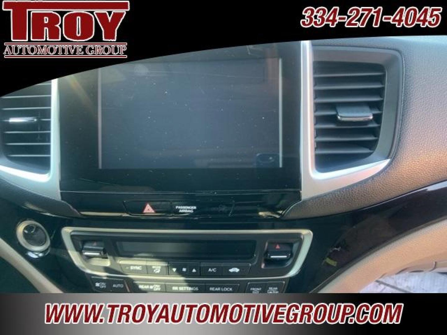 2017 White Diamond Pearl /Beige Honda Pilot Elite (5FNYF6H02HB) with an 3.5L V6 24V SOHC i-VTEC engine, Automatic transmission, located at 6812 Atlanta Hwy, Montgomery, AL, 36117, (334) 271-4045, 32.382118, -86.178673 - Photo#39