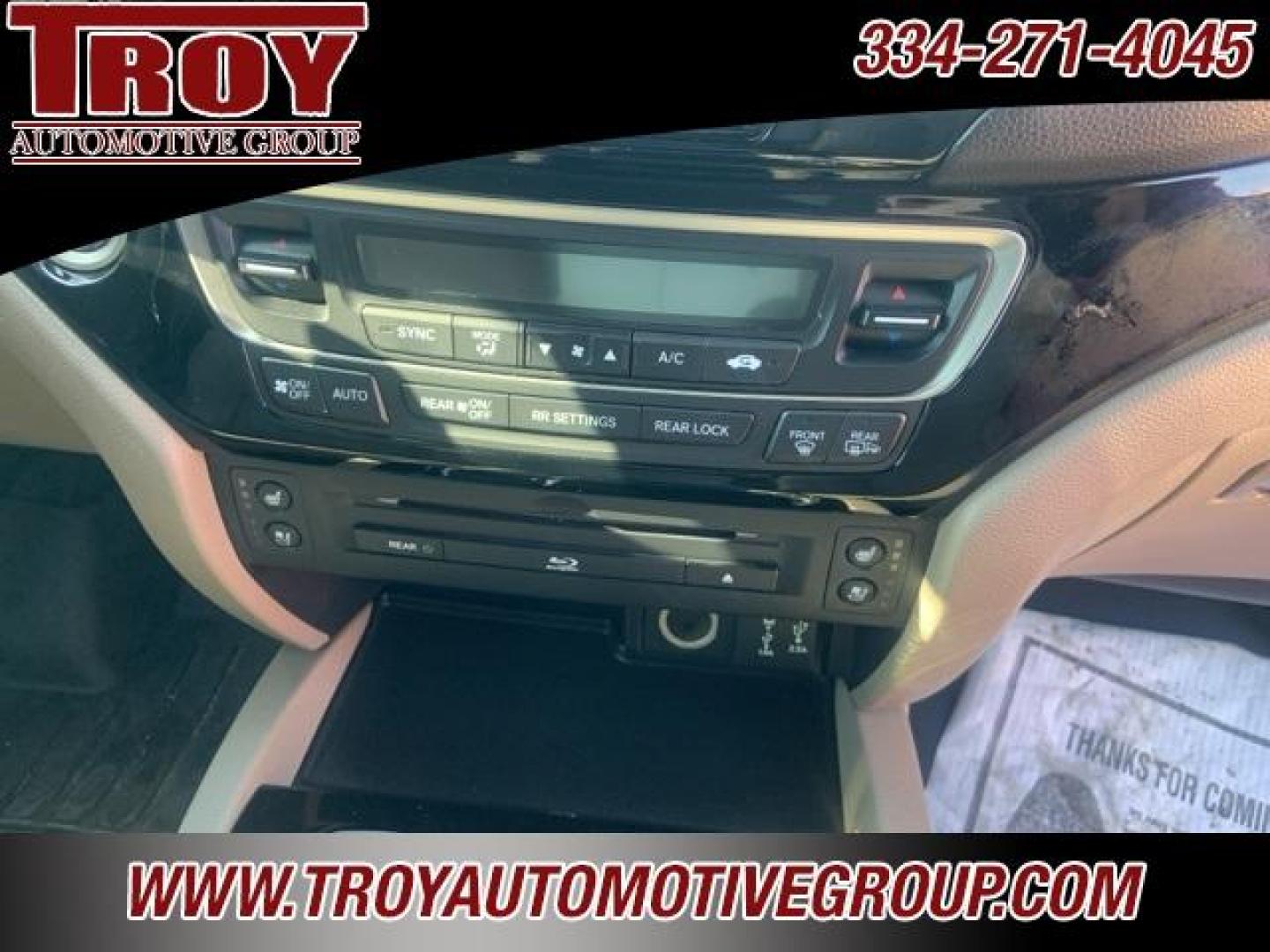 2017 White Diamond Pearl /Beige Honda Pilot Elite (5FNYF6H02HB) with an 3.5L V6 24V SOHC i-VTEC engine, Automatic transmission, located at 6812 Atlanta Hwy, Montgomery, AL, 36117, (334) 271-4045, 32.382118, -86.178673 - Photo#40