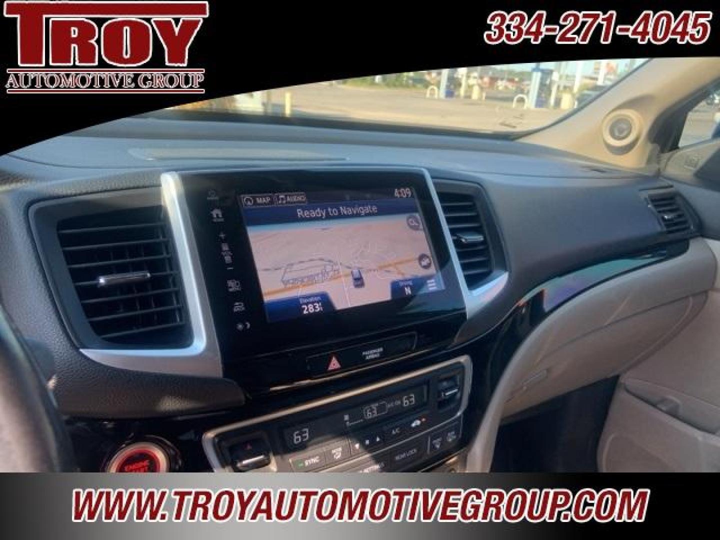 2017 White Diamond Pearl /Beige Honda Pilot Elite (5FNYF6H02HB) with an 3.5L V6 24V SOHC i-VTEC engine, Automatic transmission, located at 6812 Atlanta Hwy, Montgomery, AL, 36117, (334) 271-4045, 32.382118, -86.178673 - Photo#62