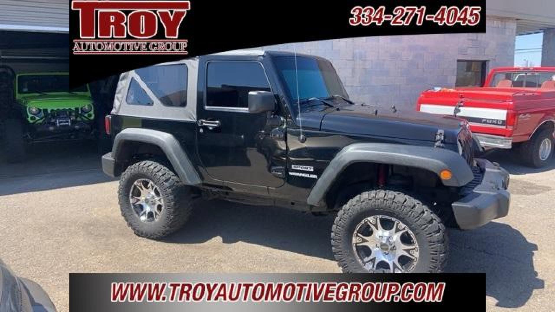 2011 Black Clearcoat /Black Jeep Wrangler Sport (1J4AA2D12BL) with an 3.8L V6 SMPI engine, Automatic transmission, located at 6812 Atlanta Hwy, Montgomery, AL, 36117, (334) 271-4045, 32.382118, -86.178673 - Black Clearcoat 2011 Jeep Wrangler Sport 4WD 3.8L V6 SMPI 4-Speed Automatic VLP<br><br>Financing Available---Top Value for Trades.<br><br>Odometer is 53348 miles below market average!<br><br><br>Awards:<br> * 2011 KBB.com 10 Best Used SUVs Under $20,000 * 2011 KBB.com Best Resale Value Awards - Photo#1