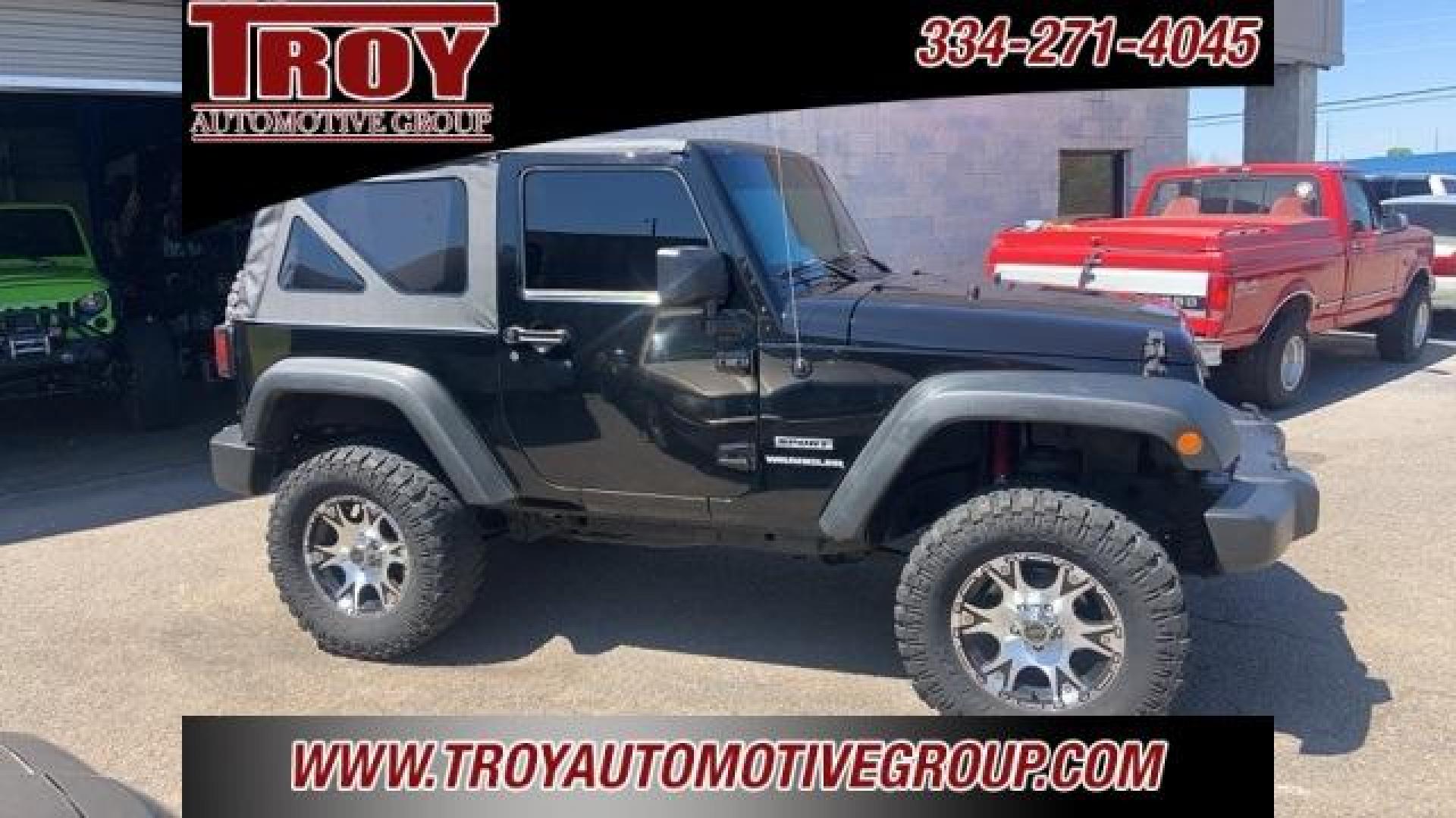 2011 Black Clearcoat /Black Jeep Wrangler Sport (1J4AA2D12BL) with an 3.8L V6 SMPI engine, Automatic transmission, located at 6812 Atlanta Hwy, Montgomery, AL, 36117, (334) 271-4045, 32.382118, -86.178673 - Black Clearcoat 2011 Jeep Wrangler Sport 4WD 3.8L V6 SMPI 4-Speed Automatic VLP<br><br>Financing Available---Top Value for Trades.<br><br>Odometer is 53348 miles below market average!<br><br><br>Awards:<br> * 2011 KBB.com 10 Best Used SUVs Under $20,000 * 2011 KBB.com Best Resale Value Awards - Photo#2