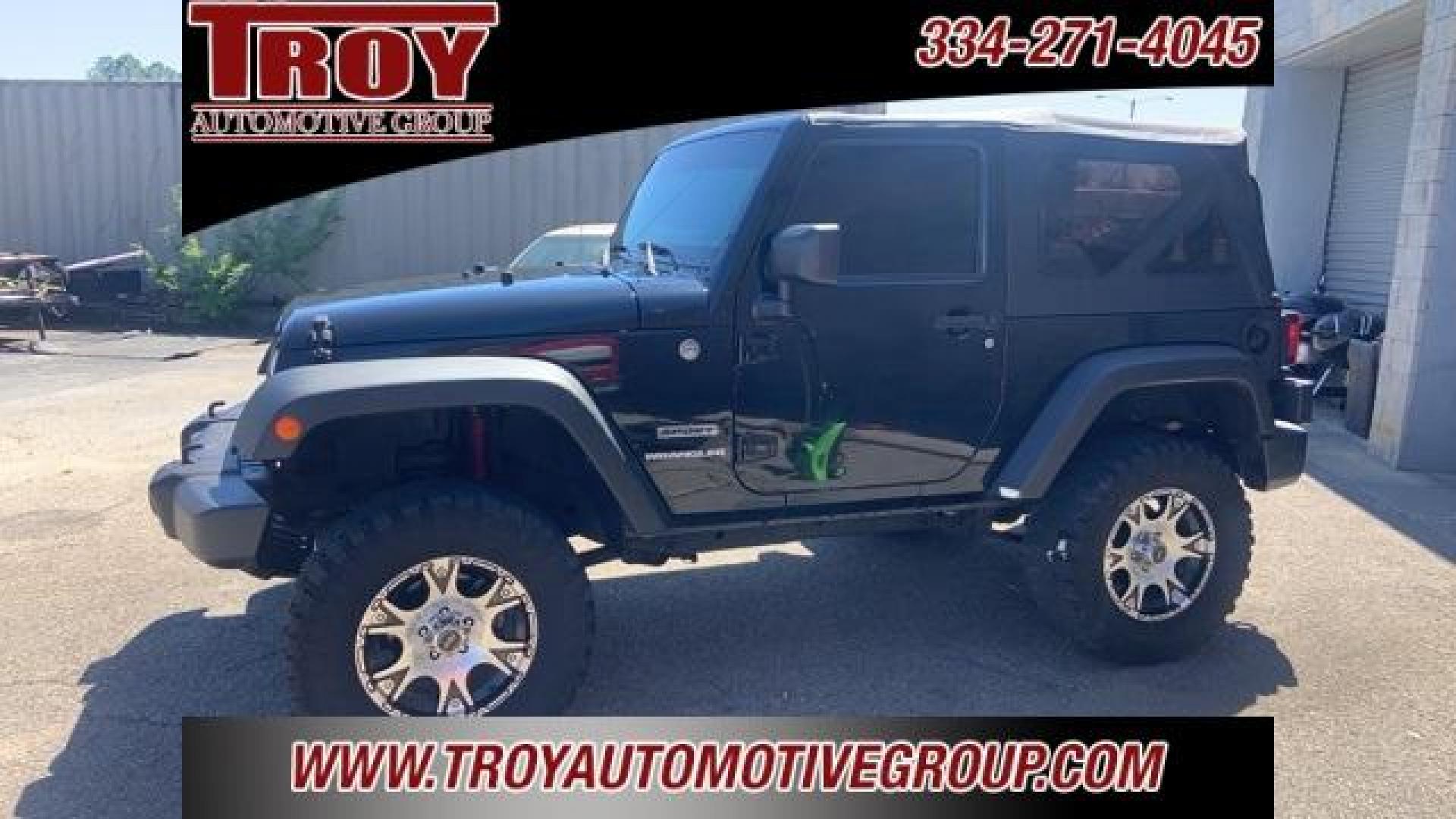 2011 Black Clearcoat /Black Jeep Wrangler Sport (1J4AA2D12BL) with an 3.8L V6 SMPI engine, Automatic transmission, located at 6812 Atlanta Hwy, Montgomery, AL, 36117, (334) 271-4045, 32.382118, -86.178673 - Black Clearcoat 2011 Jeep Wrangler Sport 4WD 3.8L V6 SMPI 4-Speed Automatic VLP<br><br>Financing Available---Top Value for Trades.<br><br>Odometer is 53348 miles below market average!<br><br><br>Awards:<br> * 2011 KBB.com 10 Best Used SUVs Under $20,000 * 2011 KBB.com Best Resale Value Awards - Photo#29