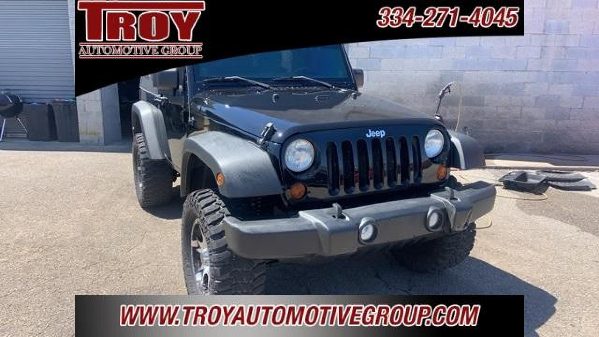 2011 Black Clearcoat /Black Jeep Wrangler Sport (1J4AA2D12BL) with an 3.8L V6 SMPI engine, Automatic transmission, located at 6812 Atlanta Hwy, Montgomery, AL, 36117, (334) 271-4045, 32.382118, -86.178673 - Black Clearcoat 2011 Jeep Wrangler Sport 4WD 3.8L V6 SMPI 4-Speed Automatic VLP<br><br>Financing Available---Top Value for Trades.<br><br>Odometer is 53348 miles below market average!<br><br><br>Awards:<br> * 2011 KBB.com 10 Best Used SUVs Under $20,000 * 2011 KBB.com Best Resale Value Awards - Photo#4