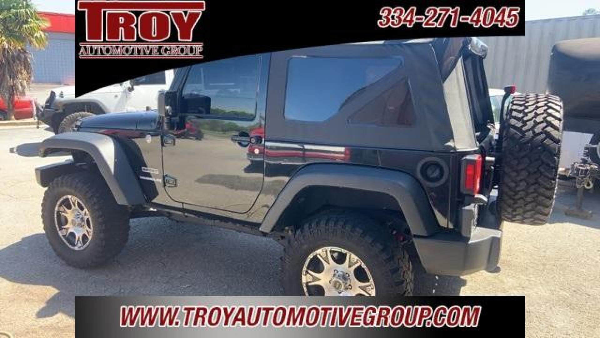 2011 Black Clearcoat /Black Jeep Wrangler Sport (1J4AA2D12BL) with an 3.8L V6 SMPI engine, Automatic transmission, located at 6812 Atlanta Hwy, Montgomery, AL, 36117, (334) 271-4045, 32.382118, -86.178673 - Black Clearcoat 2011 Jeep Wrangler Sport 4WD 3.8L V6 SMPI 4-Speed Automatic VLP<br><br>Financing Available---Top Value for Trades.<br><br>Odometer is 53348 miles below market average!<br><br><br>Awards:<br> * 2011 KBB.com 10 Best Used SUVs Under $20,000 * 2011 KBB.com Best Resale Value Awards - Photo#7