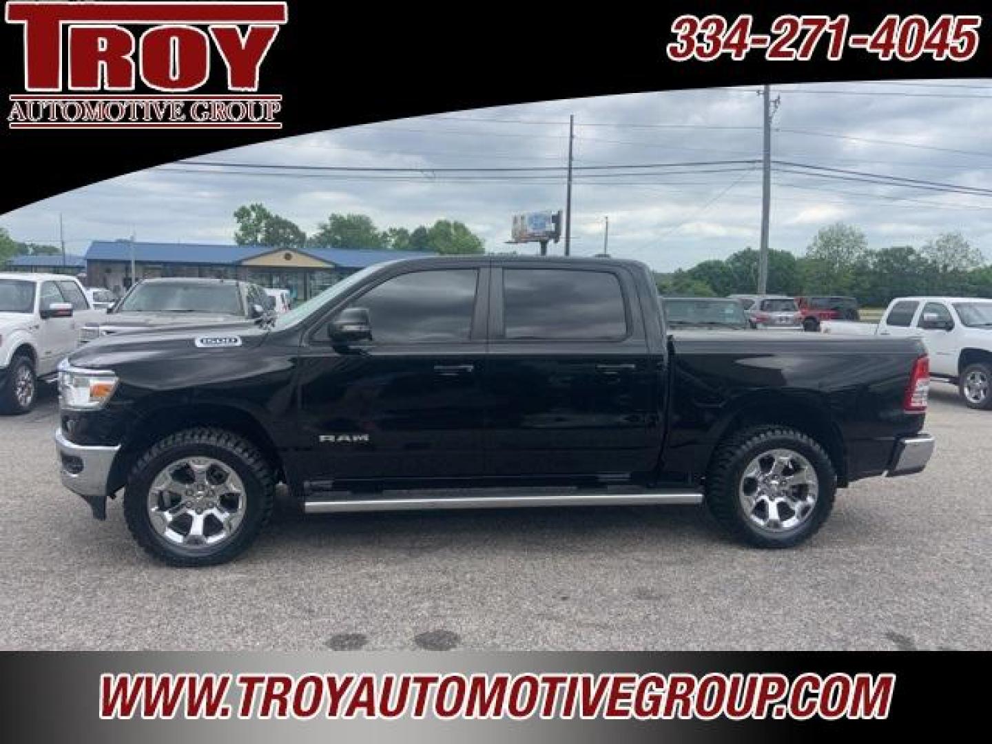 2021 Diamond Black Crystal Pearlcoat /Diesel Gray/Black Ram 1500 Big Horn/Lone Star (1C6SRFFT8MN) with an HEMI 5.7L V8 Multi Displacement VVT engine, Automatic transmission, located at 6812 Atlanta Hwy, Montgomery, AL, 36117, (334) 271-4045, 32.382118, -86.178673 - 1-Owner Local Trade!!<br>New 33x12.50x20 tires and level kit!!<br>Navigation!!<br>Premium 20 Wheels!!<br>Alpine Sound System!!<br>Hemi E-Torque V8 Engine!!<br>Heated Seats!!<br>Power Driver Seat <br>Tow Package!!<br>Flip Up Premium Bed Cover !!<br>Remote Start! - Photo#0