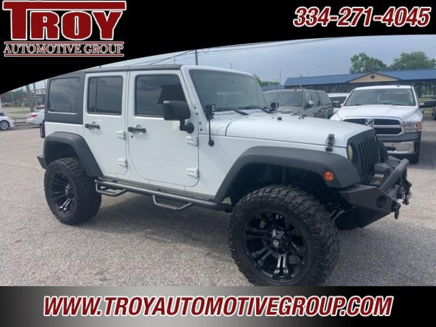 2016 Bright White Clearcoat /Black Jeep Wrangler Unlimited Sport (1C4BJWDGXGL) with an 3.6L V6 24V VVT engine, Automatic transmission, located at 6812 Atlanta Hwy, Montgomery, AL, 36117, (334) 271-4045, 32.382118, -86.178673 - Fuel Wheels w/Matching Spare!!<br>Warn Winch!!<br> - Photo#0