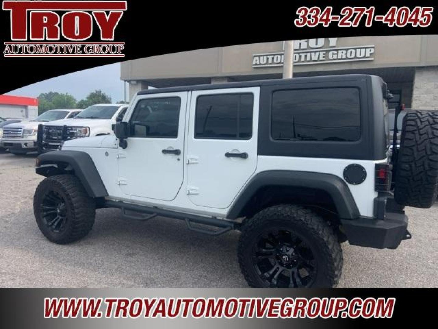 2016 Bright White Clearcoat /Black Jeep Wrangler Unlimited Sport (1C4BJWDGXGL) with an 3.6L V6 24V VVT engine, Automatic transmission, located at 6812 Atlanta Hwy, Montgomery, AL, 36117, (334) 271-4045, 32.382118, -86.178673 - Fuel Wheels w/Matching Spare!!<br>Warn Winch!!<br> - Photo#11