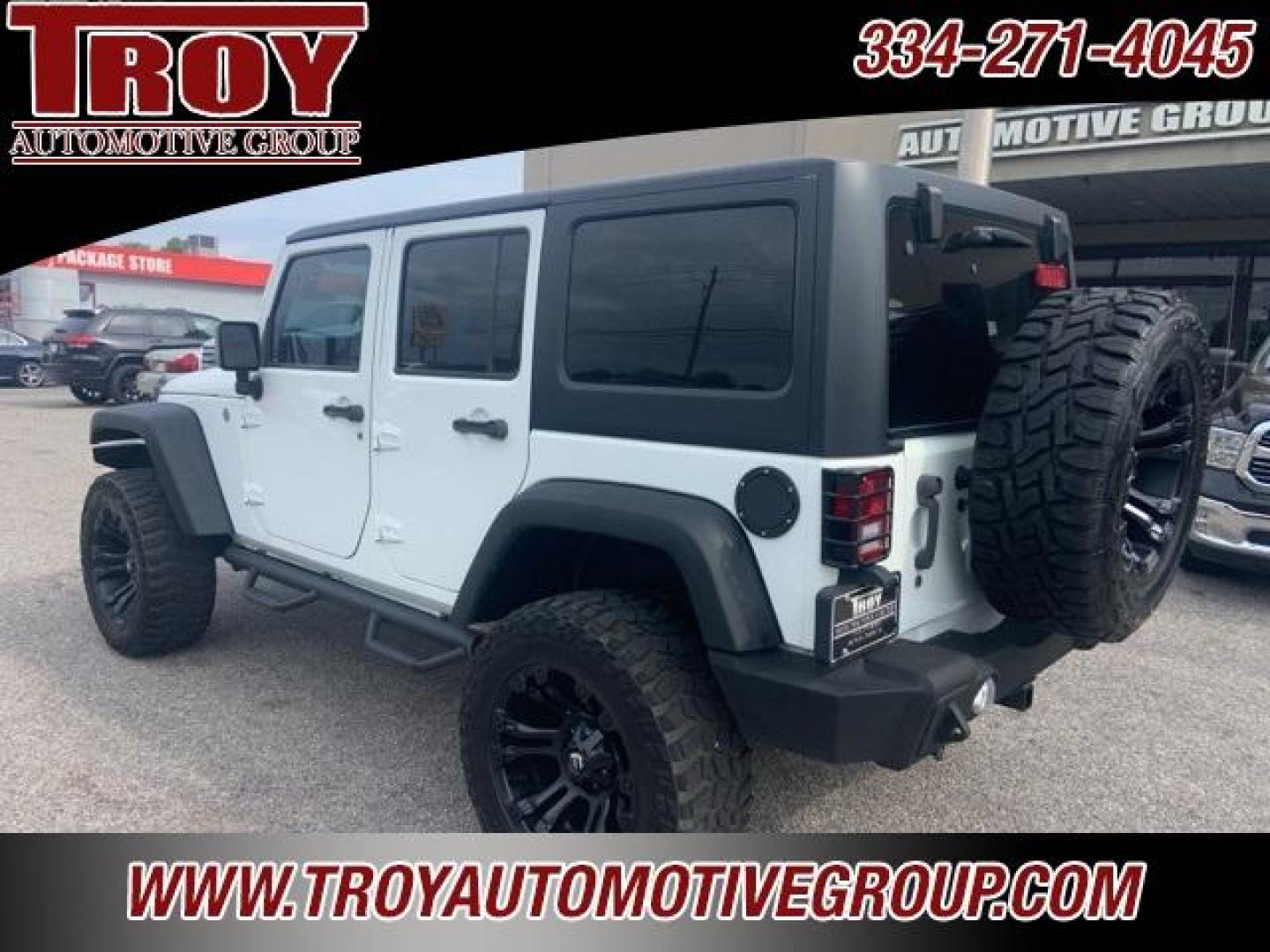 2016 Bright White Clearcoat /Black Jeep Wrangler Unlimited Sport (1C4BJWDGXGL) with an 3.6L V6 24V VVT engine, Automatic transmission, located at 6812 Atlanta Hwy, Montgomery, AL, 36117, (334) 271-4045, 32.382118, -86.178673 - Fuel Wheels w/Matching Spare!!<br>Warn Winch!!<br> - Photo#12