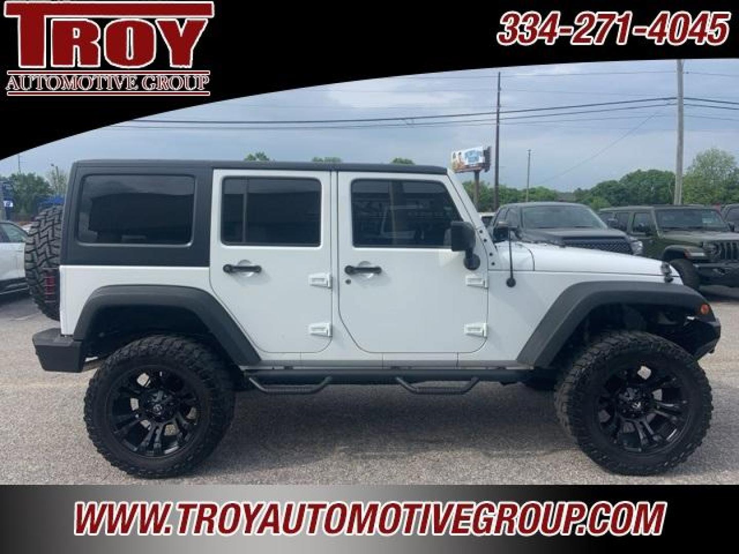 2016 Bright White Clearcoat /Black Jeep Wrangler Unlimited Sport (1C4BJWDGXGL) with an 3.6L V6 24V VVT engine, Automatic transmission, located at 6812 Atlanta Hwy, Montgomery, AL, 36117, (334) 271-4045, 32.382118, -86.178673 - Fuel Wheels w/Matching Spare!!<br>Warn Winch!!<br> - Photo#1