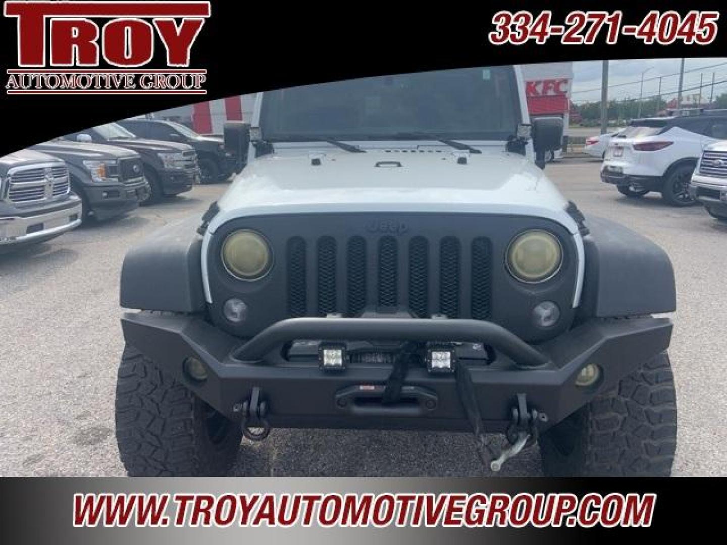 2016 Bright White Clearcoat /Black Jeep Wrangler Unlimited Sport (1C4BJWDGXGL) with an 3.6L V6 24V VVT engine, Automatic transmission, located at 6812 Atlanta Hwy, Montgomery, AL, 36117, (334) 271-4045, 32.382118, -86.178673 - Fuel Wheels w/Matching Spare!!<br>Warn Winch!!<br> - Photo#5