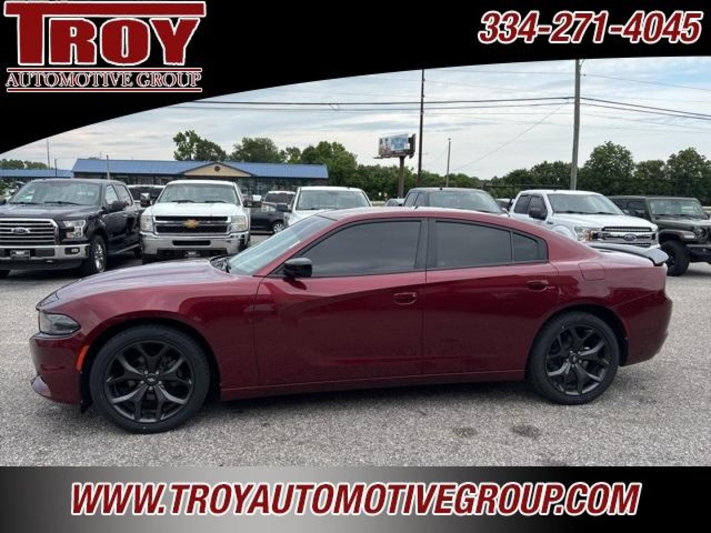 2020 Octane Red Pearlcoat /Black Dodge Charger SXT (2C3CDXBG8LH) with an 3.6L V6 24V VVT engine, Automatic transmission, located at 6812 Atlanta Hwy, Montgomery, AL, 36117, (334) 271-4045, 32.382118, -86.178673 - Recent Arrival!<br>New Tires-Just Serviced!!<br><br>Octane Red Pearlcoat 2020 Dodge Charger SXT RWD 3.6L V6 24V VVT 8-Speed Automatic<br><br>Financing Available---Top Value for Trades.<br><br>Odometer is 2762 miles below market average! 19/30 City/Highway MP - Photo#1