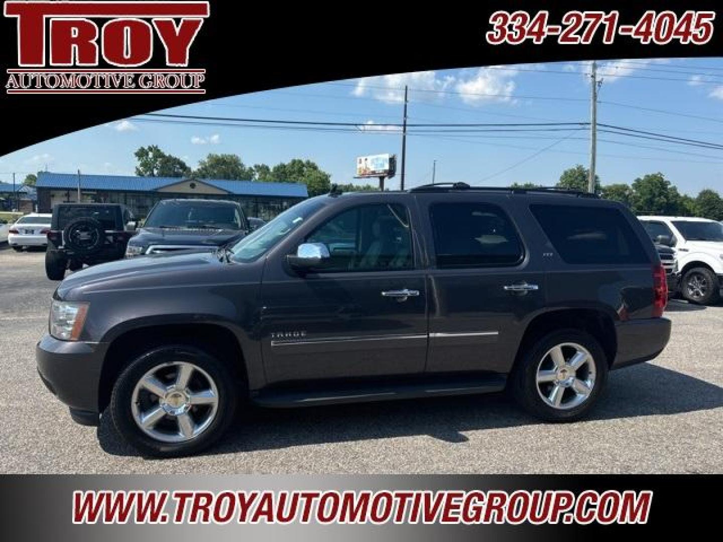 2011 Taupe Gray Metallic /Light Titanium/Dark Titanium Chevrolet Tahoe LTZ (1GNSCCE01BR) with an Vortec 5.3L V8 SFI Flex Fuel Iron Block engine, Automatic transmission, located at 6812 Atlanta Hwy, Montgomery, AL, 36117, (334) 271-4045, 32.382118, -86.178673 - Power Sunroof!!<br>TV/DVD!!<br>Rear Bucket Seats!!<br>Navigation!!<br>Tow Package!! - Photo#0