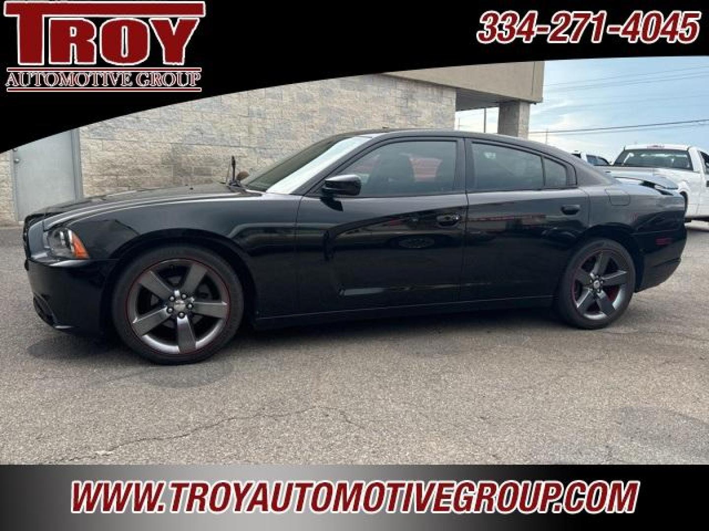 2014 Pitch Black /Black Dodge Charger SXT (2C3CDXHG9EH) with an 3.6L V6 24V VVT engine, Automatic transmission, located at 6812 Atlanta Hwy, Montgomery, AL, 36117, (334) 271-4045, 32.382118, -86.178673 - Red Line Package!!<br>Beats Sound System!! - Photo#1