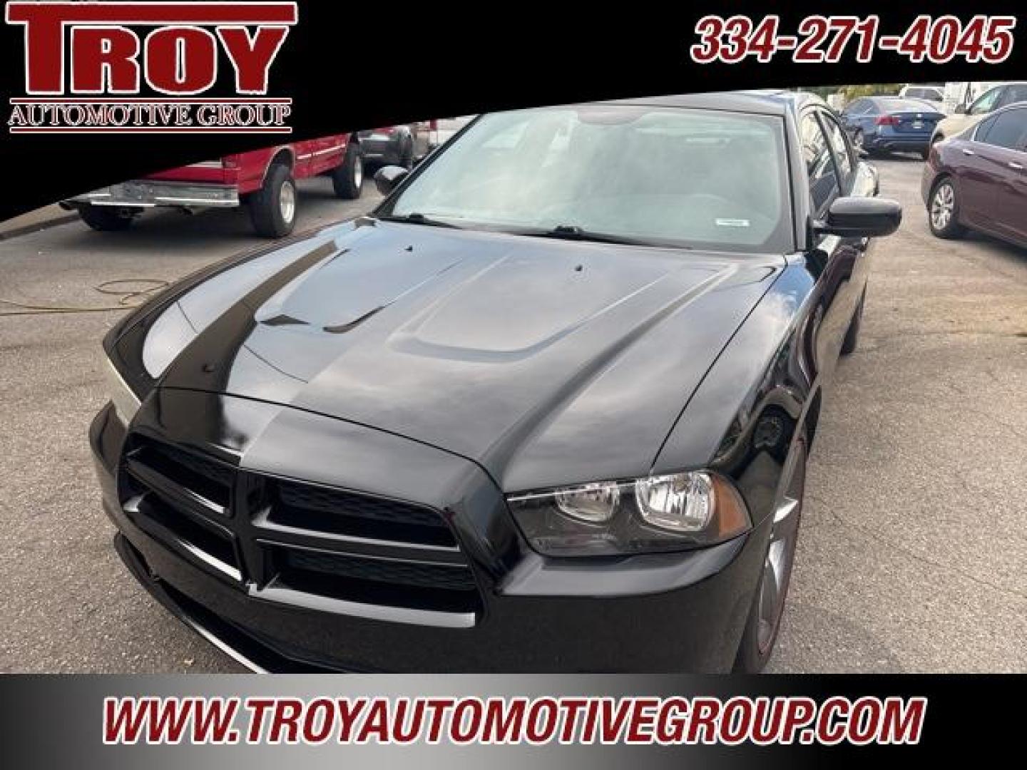 2014 Pitch Black /Black Dodge Charger SXT (2C3CDXHG9EH) with an 3.6L V6 24V VVT engine, Automatic transmission, located at 6812 Atlanta Hwy, Montgomery, AL, 36117, (334) 271-4045, 32.382118, -86.178673 - Red Line Package!!<br>Beats Sound System!! - Photo#2