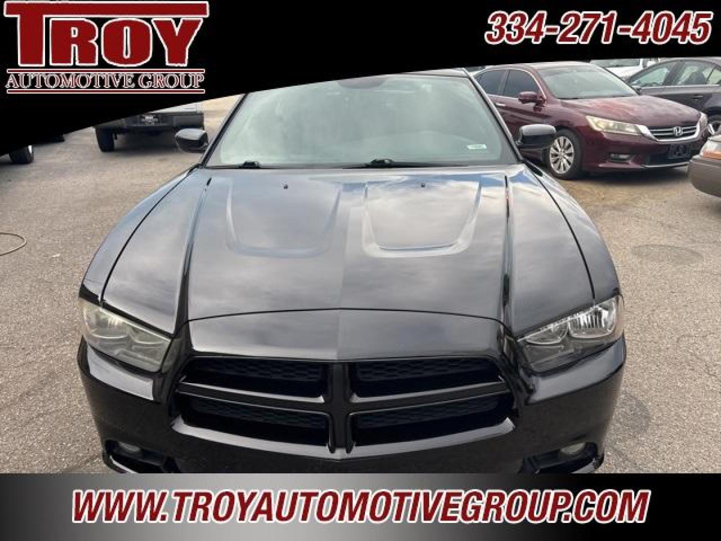 2014 Pitch Black /Black Dodge Charger SXT (2C3CDXHG9EH) with an 3.6L V6 24V VVT engine, Automatic transmission, located at 6812 Atlanta Hwy, Montgomery, AL, 36117, (334) 271-4045, 32.382118, -86.178673 - Red Line Package!!<br>Beats Sound System!! - Photo#3