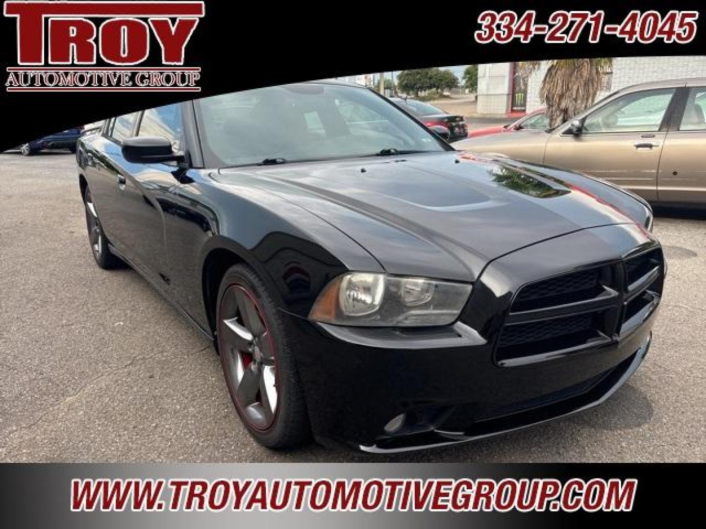 2014 Pitch Black /Black Dodge Charger SXT (2C3CDXHG9EH) with an 3.6L V6 24V VVT engine, Automatic transmission, located at 6812 Atlanta Hwy, Montgomery, AL, 36117, (334) 271-4045, 32.382118, -86.178673 - Red Line Package!!<br>Beats Sound System!! - Photo#4