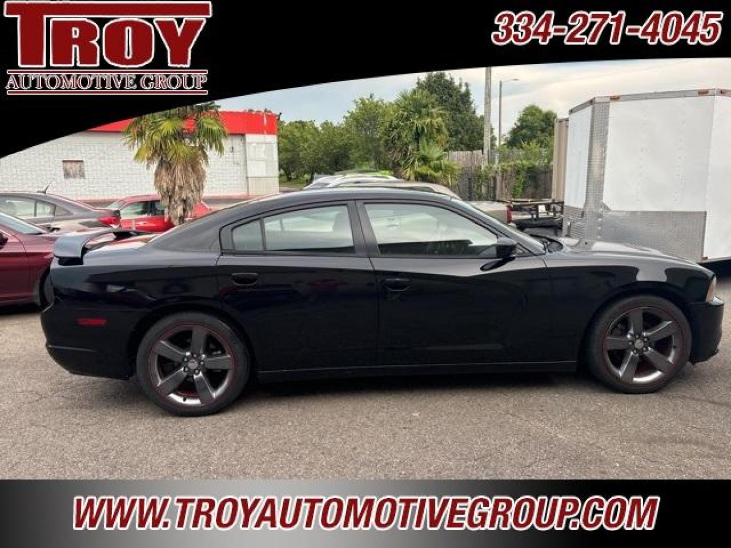 2014 Pitch Black /Black Dodge Charger SXT (2C3CDXHG9EH) with an 3.6L V6 24V VVT engine, Automatic transmission, located at 6812 Atlanta Hwy, Montgomery, AL, 36117, (334) 271-4045, 32.382118, -86.178673 - Red Line Package!!<br>Beats Sound System!! - Photo#5