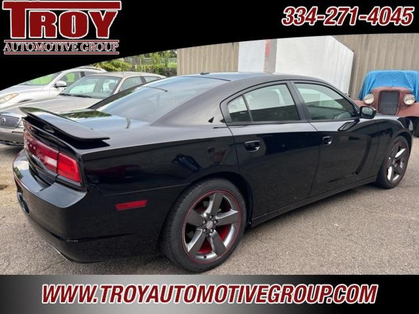 2014 Pitch Black /Black Dodge Charger SXT (2C3CDXHG9EH) with an 3.6L V6 24V VVT engine, Automatic transmission, located at 6812 Atlanta Hwy, Montgomery, AL, 36117, (334) 271-4045, 32.382118, -86.178673 - Red Line Package!!<br>Beats Sound System!! - Photo#6