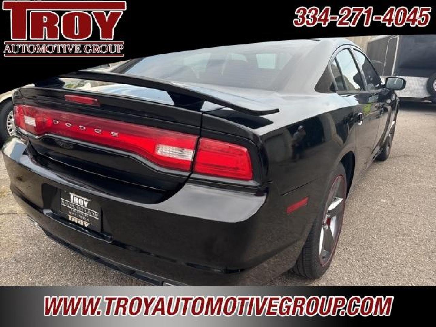 2014 Pitch Black /Black Dodge Charger SXT (2C3CDXHG9EH) with an 3.6L V6 24V VVT engine, Automatic transmission, located at 6812 Atlanta Hwy, Montgomery, AL, 36117, (334) 271-4045, 32.382118, -86.178673 - Red Line Package!!<br>Beats Sound System!! - Photo#7