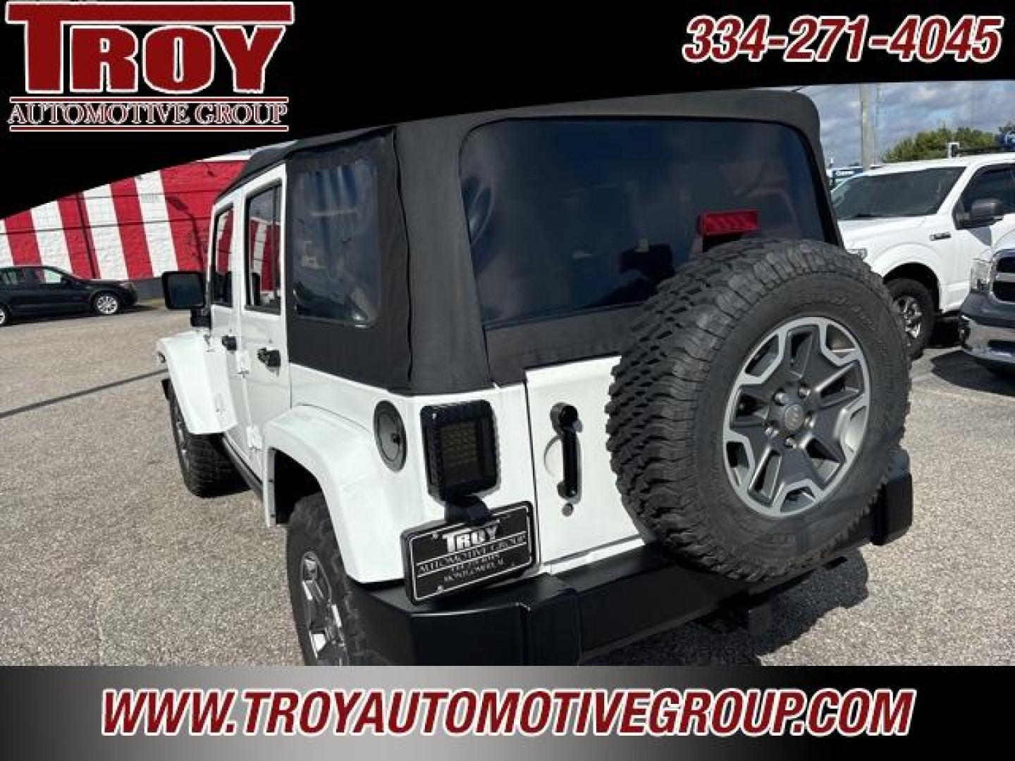 2017 Bright White Clearcoat /Dark Olive/Black Jeep Wrangler Unlimited Rubicon (1C4HJWFG5HL) with an 3.6L V6 24V VVT engine, Automatic transmission, located at 6812 Atlanta Hwy, Montgomery, AL, 36117, (334) 271-4045, 32.382118, -86.178673 - Only 59k!!<br>Saddle Leather Interior!!<br>Heated Seats!!<br>Tow Package!!<br>Alpine Premium Sound!!<br> - Photo#12