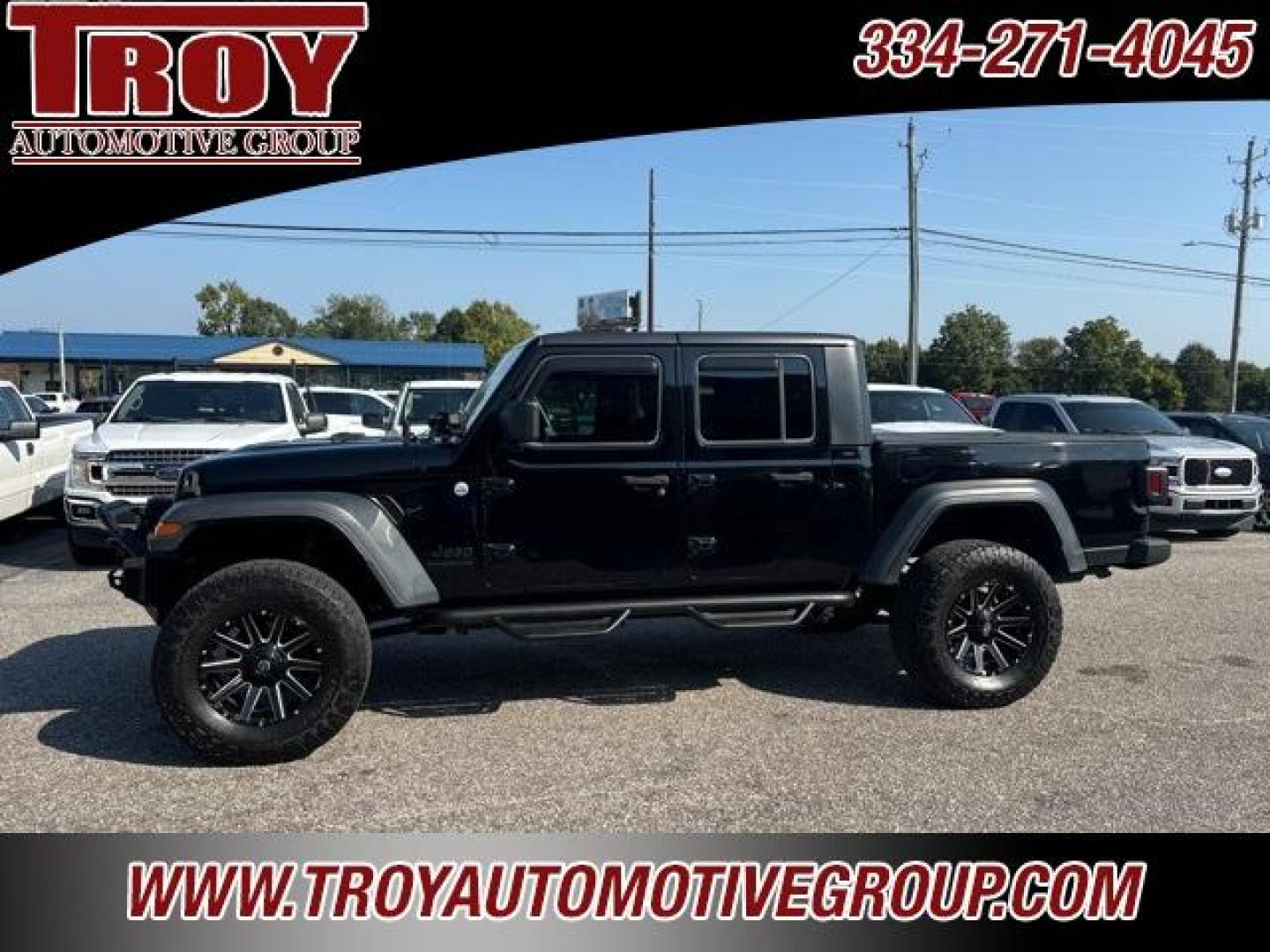 2020 Black Clearcoat /Black Jeep Gladiator Sport (1C6JJTAG4LL) with an 3.6L V6 24V VVT engine, Automatic transmission, located at 6812 Atlanta Hwy, Montgomery, AL, 36117, (334) 271-4045, 32.382118, -86.178673 - 1-Owner!!<br>Fox Lift Kit!!<br>Fuel Wheels w/35x12.50x18 cooper AT3 tires!!<br>Winch w/Synthetic Rope!! and Light Bar!!<br>Midland CB Radio!!<br>Stinger Custom Touch Screen Radio! ($700)!<br>Custom JL 10s w/JL Ampn<br>4 Cube Lights Hood Mounted!!<br>N Fab Step.Bars!<br>Rough Country Neoprene Seat - Photo#0