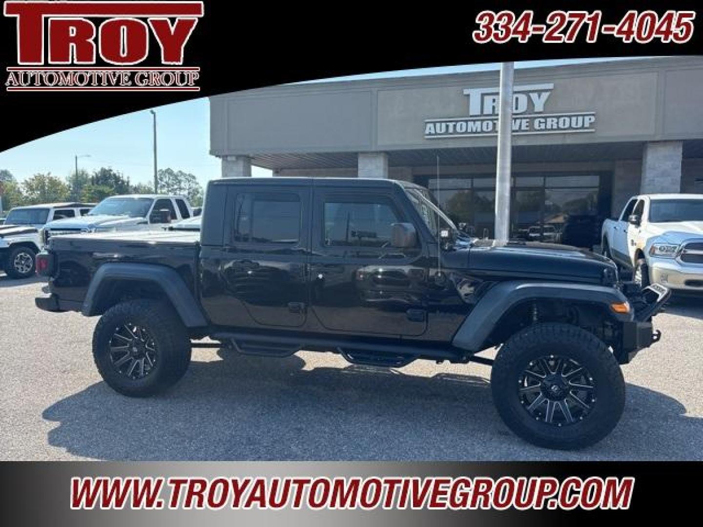 2020 Black Clearcoat /Black Jeep Gladiator Sport (1C6JJTAG4LL) with an 3.6L V6 24V VVT engine, Automatic transmission, located at 6812 Atlanta Hwy, Montgomery, AL, 36117, (334) 271-4045, 32.382118, -86.178673 - 1-Owner!!<br>Fox Lift Kit!!<br>Fuel Wheels w/35x12.50x18 cooper AT3 tires!!<br>Winch w/Synthetic Rope!! and Light Bar!!<br>Midland CB Radio!!<br>Stinger Custom Touch Screen Radio! ($700)!<br>Custom JL 10s w/JL Ampn<br>4 Cube Lights Hood Mounted!!<br>N Fab Step.Bars!<br>Rough Country Neoprene Seat - Photo#9