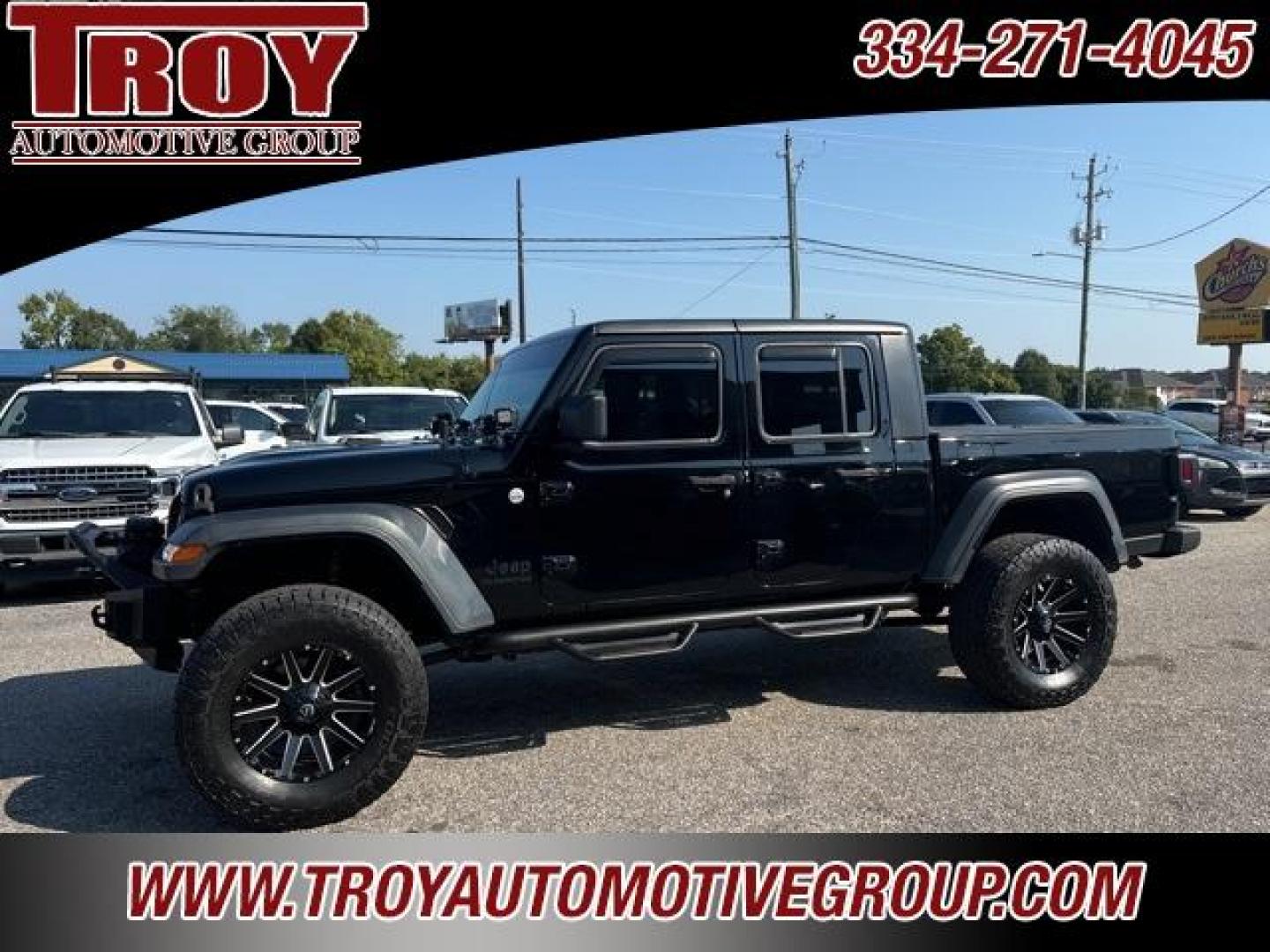 2020 Black Clearcoat /Black Jeep Gladiator Sport (1C6JJTAG4LL) with an 3.6L V6 24V VVT engine, Automatic transmission, located at 6812 Atlanta Hwy, Montgomery, AL, 36117, (334) 271-4045, 32.382118, -86.178673 - 1-Owner!!<br>Fox Lift Kit!!<br>Fuel Wheels w/35x12.50x18 cooper AT3 tires!!<br>Winch w/Synthetic Rope!! and Light Bar!!<br>Midland CB Radio!!<br>Stinger Custom Touch Screen Radio! ($700)!<br>Custom JL 10s w/JL Ampn<br>4 Cube Lights Hood Mounted!!<br>N Fab Step.Bars!<br>Rough Country Neoprene Seat - Photo#2