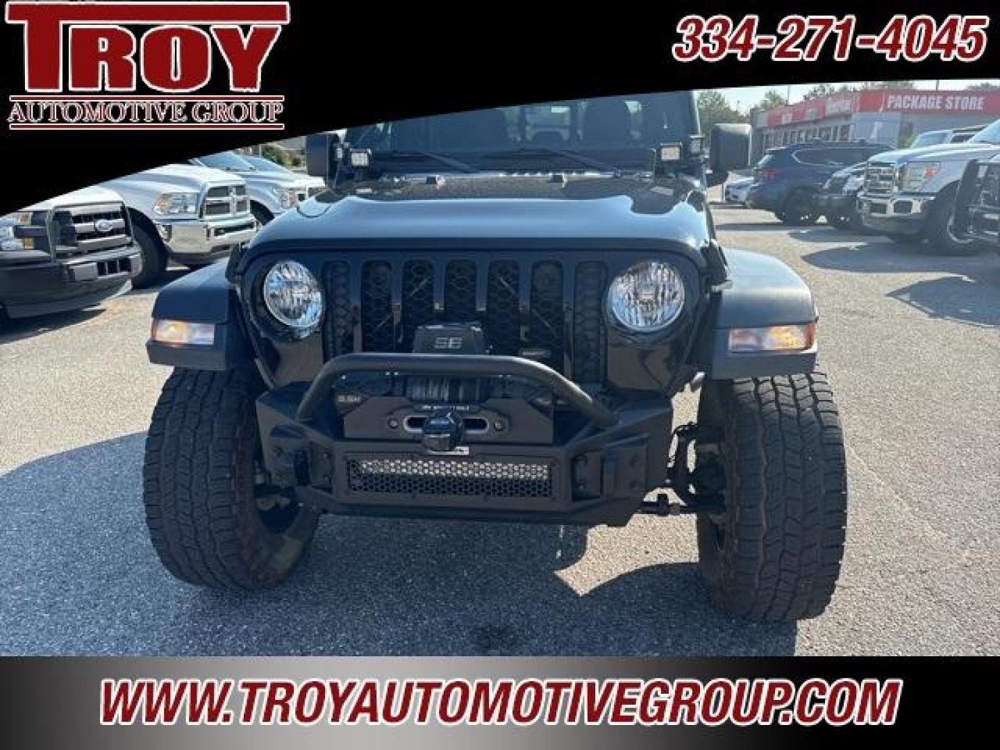 2020 Black Clearcoat /Black Jeep Gladiator Sport (1C6JJTAG4LL) with an 3.6L V6 24V VVT engine, Automatic transmission, located at 6812 Atlanta Hwy, Montgomery, AL, 36117, (334) 271-4045, 32.382118, -86.178673 - 1-Owner!!<br>Fox Lift Kit!!<br>Fuel Wheels w/35x12.50x18 cooper AT3 tires!!<br>Winch w/Synthetic Rope!! and Light Bar!!<br>Midland CB Radio!!<br>Stinger Custom Touch Screen Radio! ($700)!<br>Custom JL 10s w/JL Ampn<br>4 Cube Lights Hood Mounted!!<br>N Fab Step.Bars!<br>Rough Country Neoprene Seat - Photo#5