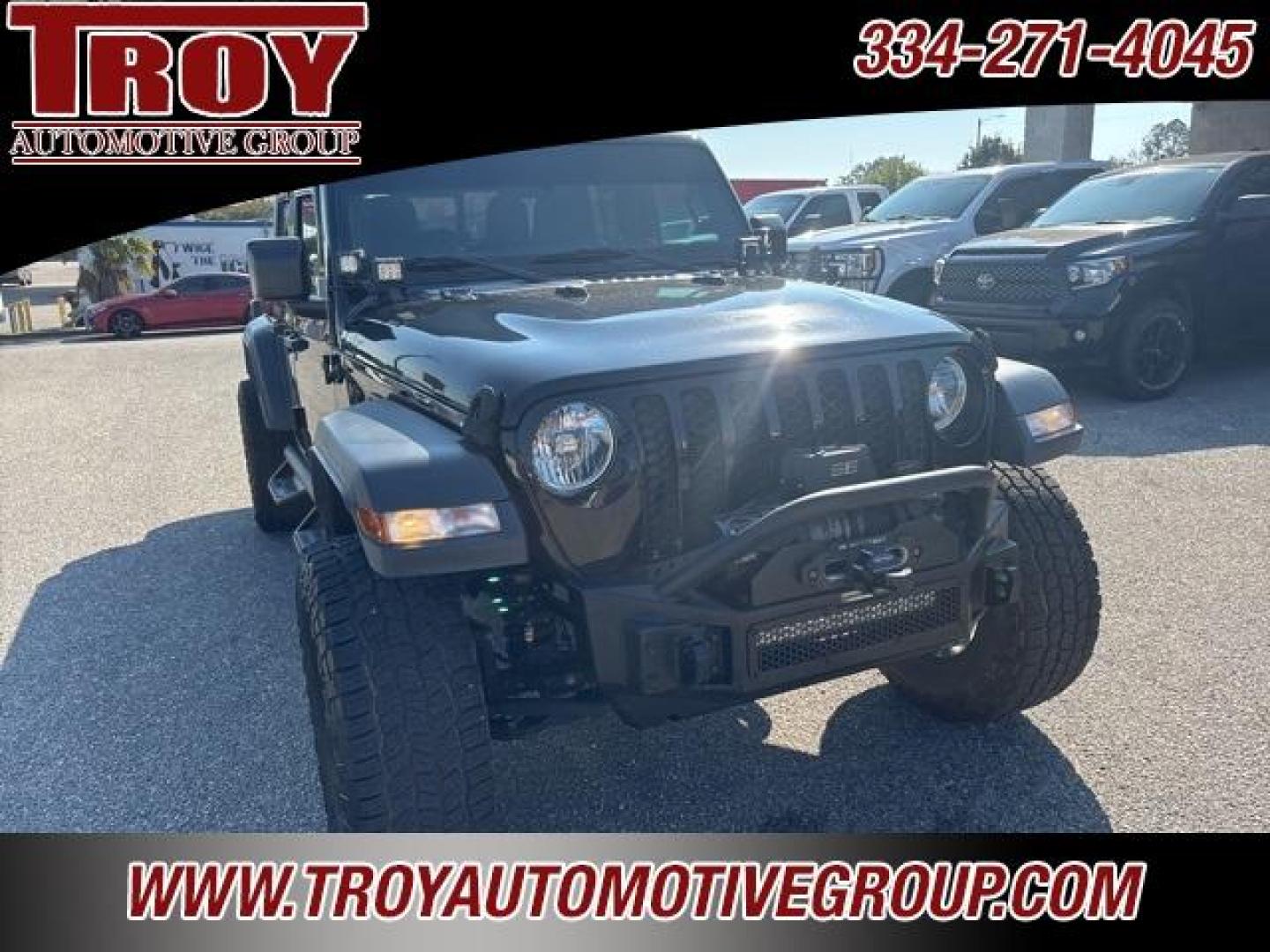 2020 Black Clearcoat /Black Jeep Gladiator Sport (1C6JJTAG4LL) with an 3.6L V6 24V VVT engine, Automatic transmission, located at 6812 Atlanta Hwy, Montgomery, AL, 36117, (334) 271-4045, 32.382118, -86.178673 - 1-Owner!!<br>Fox Lift Kit!!<br>Fuel Wheels w/35x12.50x18 cooper AT3 tires!!<br>Winch w/Synthetic Rope!! and Light Bar!!<br>Midland CB Radio!!<br>Stinger Custom Touch Screen Radio! ($700)!<br>Custom JL 10s w/JL Ampn<br>4 Cube Lights Hood Mounted!!<br>N Fab Step.Bars!<br>Rough Country Neoprene Seat - Photo#6