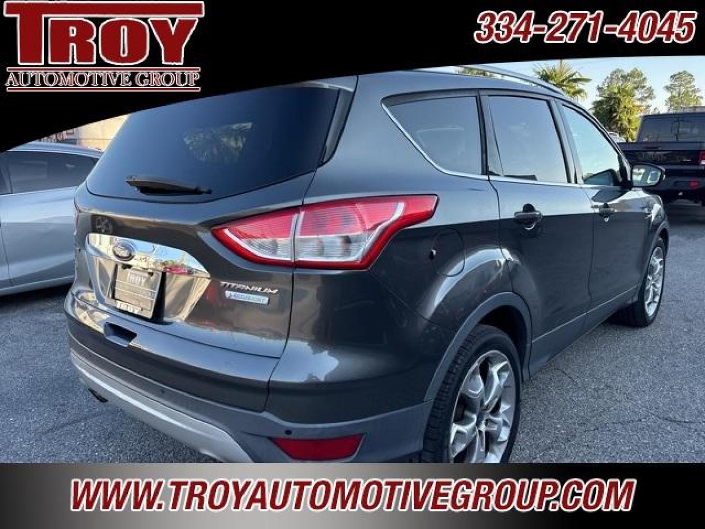 2015 Magnetic /Medium Light Stone Ford Escape Titanium (1FMCU0J91FU) with an EcoBoost 2.0L I4 GTDi DOHC Turbocharged VCT engine, Automatic transmission, located at 6812 Atlanta Hwy, Montgomery, AL, 36117, (334) 271-4045, 32.382118, -86.178673 - Photo#11