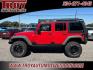 2015 Firecracker Red Clear Coat /Black Jeep Wrangler Unlimited Sport (1C4BJWDG8FL) with an 3.6L V6 24V VVT engine, Automatic transmission, located at 6812 Atlanta Hwy, Montgomery, AL, 36117, (334) 271-4045, 32.382118, -86.178673 - Fox Lift Kit!!<br>Warm Winch!!<br>Method Wheels w/BFG A/T Tires!! 35S with Full matching spare!!<br>GOBI Full Roof Rack!!<br>JW Speaker Headlights!<br>Bartact Front/Rear Seat Covers!!<br>Genesis Dual Battery Kit!! ($900)<br><br><br><br>Firecracker Red Clear Coat 2015 Jeep Wrangler Unlimited Sport 4W - Photo#14