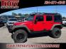 2015 Firecracker Red Clear Coat /Black Jeep Wrangler Unlimited Sport (1C4BJWDG8FL) with an 3.6L V6 24V VVT engine, Automatic transmission, located at 6812 Atlanta Hwy, Montgomery, AL, 36117, (334) 271-4045, 32.382118, -86.178673 - Fox Lift Kit!!<br>Warm Winch!!<br>Method Wheels w/BFG A/T Tires!! 35S with Full matching spare!!<br>GOBI Full Roof Rack!!<br>JW Speaker Headlights!<br>Bartact Front/Rear Seat Covers!!<br>Genesis Dual Battery Kit!! ($900)<br><br><br><br>Firecracker Red Clear Coat 2015 Jeep Wrangler Unlimited Sport 4W - Photo#1