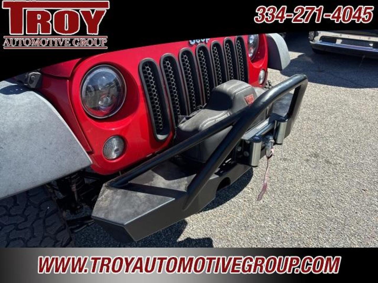 2015 Firecracker Red Clear Coat /Black Jeep Wrangler Unlimited Sport (1C4BJWDG8FL) with an 3.6L V6 24V VVT engine, Automatic transmission, located at 6812 Atlanta Hwy, Montgomery, AL, 36117, (334) 271-4045, 32.382118, -86.178673 - Fox Lift Kit!!<br>Warm Winch!!<br>Method Wheels w/BFG A/T Tires!! 35S with Full matching spare!!<br>GOBI Full Roof Rack!!<br>JW Speaker Headlights!<br>Bartact Front/Rear Seat Covers!!<br>Genesis Dual Battery Kit!! ($900)<br><br><br><br>Firecracker Red Clear Coat 2015 Jeep Wrangler Unlimited Sport 4W - Photo#21