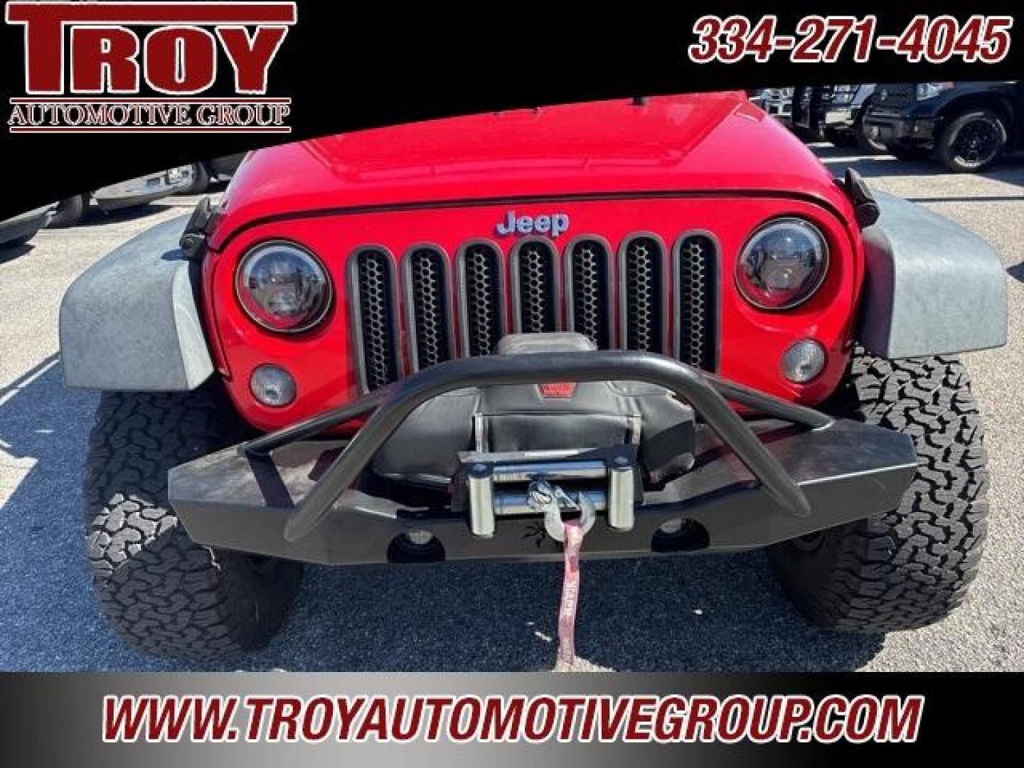 2015 Firecracker Red Clear Coat /Black Jeep Wrangler Unlimited Sport (1C4BJWDG8FL) with an 3.6L V6 24V VVT engine, Automatic transmission, located at 6812 Atlanta Hwy, Montgomery, AL, 36117, (334) 271-4045, 32.382118, -86.178673 - Fox Lift Kit!!<br>Warm Winch!!<br>Method Wheels w/BFG A/T Tires!! 35S with Full matching spare!!<br>GOBI Full Roof Rack!!<br>JW Speaker Headlights!<br>Bartact Front/Rear Seat Covers!!<br>Genesis Dual Battery Kit!! ($900)<br><br><br><br>Firecracker Red Clear Coat 2015 Jeep Wrangler Unlimited Sport 4W - Photo#22