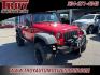 2015 Firecracker Red Clear Coat /Black Jeep Wrangler Unlimited Sport (1C4BJWDG8FL) with an 3.6L V6 24V VVT engine, Automatic transmission, located at 6812 Atlanta Hwy, Montgomery, AL, 36117, (334) 271-4045, 32.382118, -86.178673 - Fox Lift Kit!!<br>Warm Winch!!<br>Method Wheels w/BFG A/T Tires!! 35S with Full matching spare!!<br>GOBI Full Roof Rack!!<br>JW Speaker Headlights!<br>Bartact Front/Rear Seat Covers!!<br>Genesis Dual Battery Kit!! ($900)<br><br><br><br>Firecracker Red Clear Coat 2015 Jeep Wrangler Unlimited Sport 4W - Photo#6